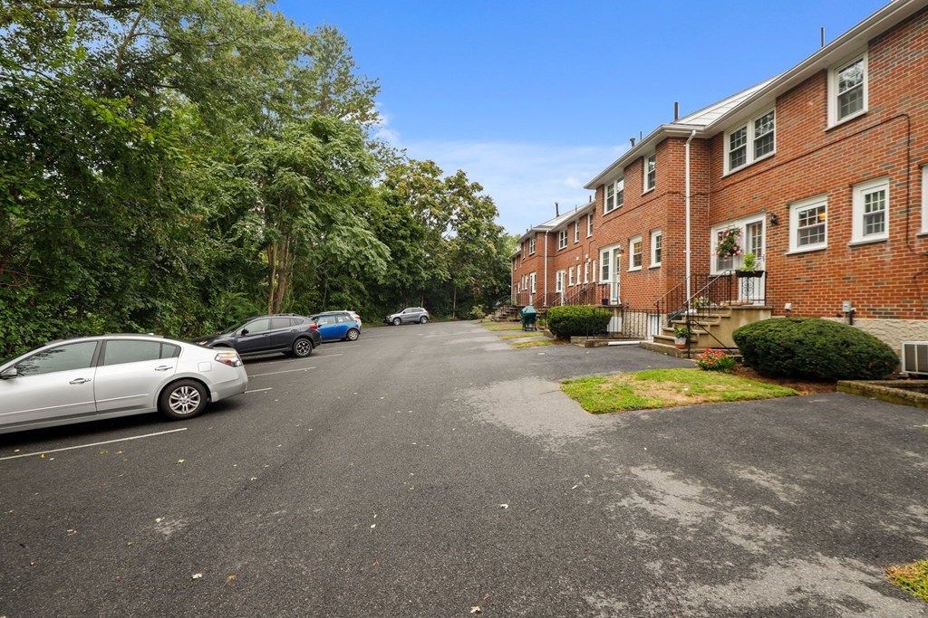 23 Clough Road, Unit 23 Dedham, MA 02026 - Photo 27 of 27 a view of street with parked cars