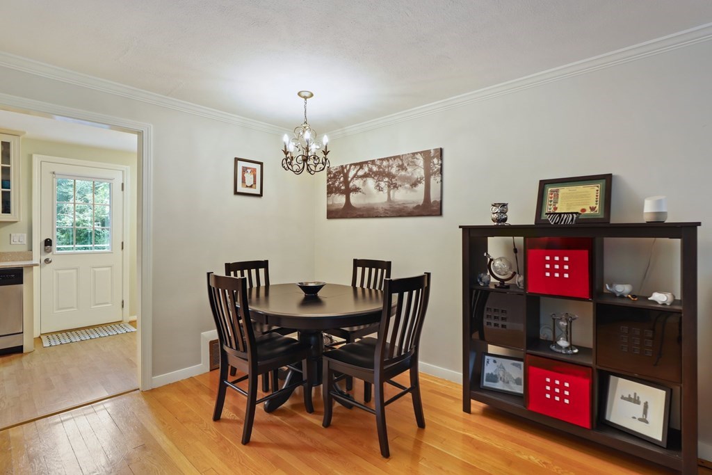 23 Clough Road, Unit 23 Dedham, MA 02026 - Photo 8 of 27 a view of a dining room with furniture