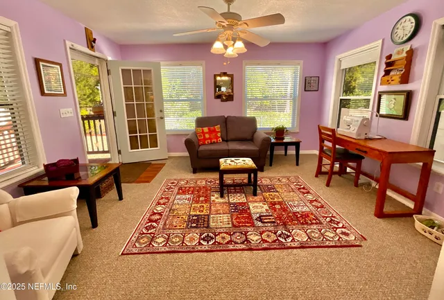 a kitchen with wooden cabinets and a stove top oven