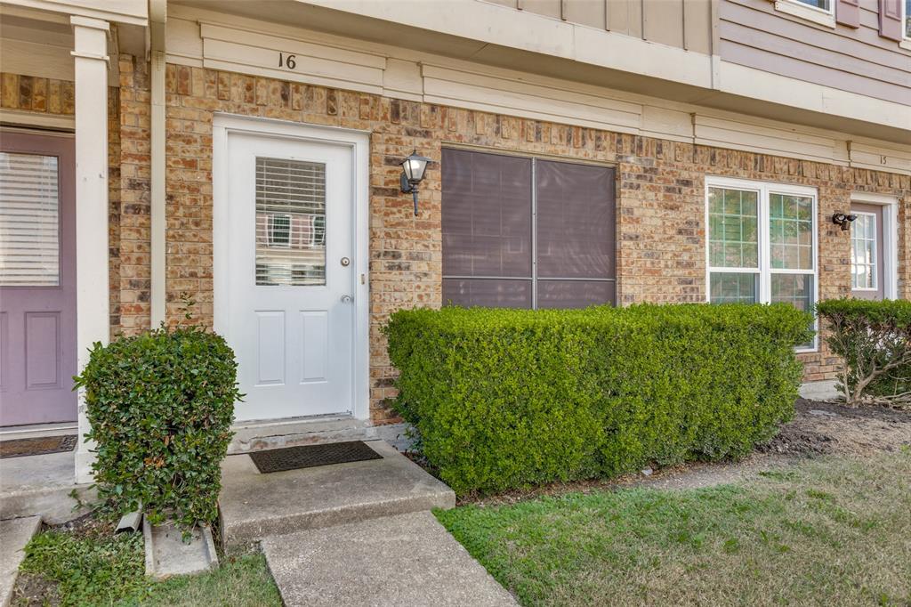 633 Carriagehouse Lane, Unit I6 Garland, TX 75040 - Photo 2 of 24 a front view of a house with garden