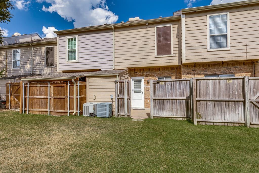 633 Carriagehouse Lane, Unit I6 Garland, TX 75040 - Photo 20 of 24 a front view of a house with a yard