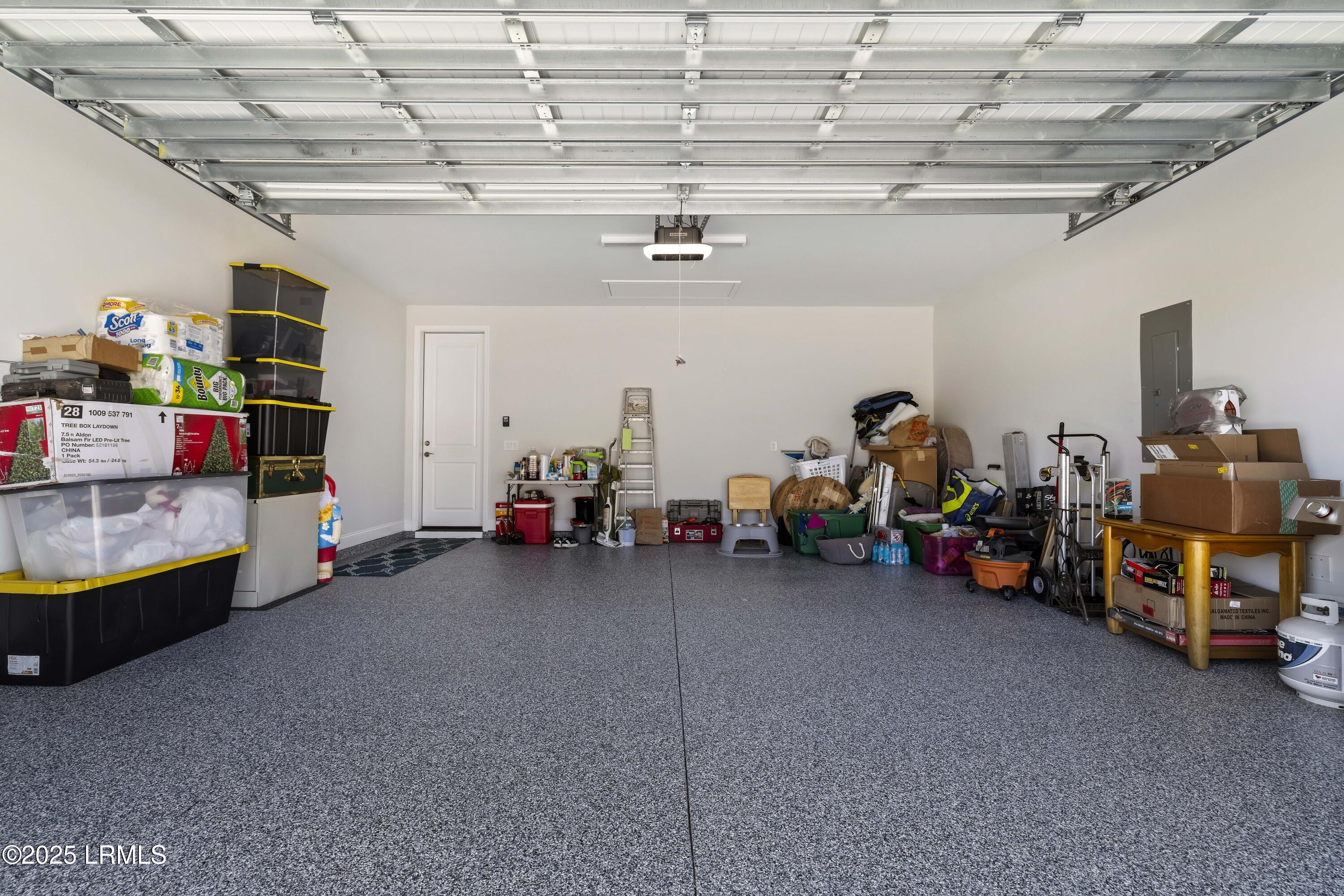 952 Good Life Way Hardeeville, SC 29927 - Photo 38 of 53 Large Garage with Epoxy Flooring