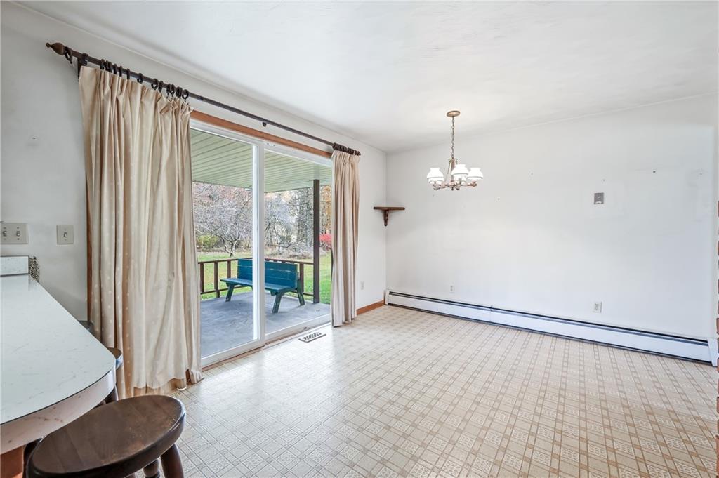 2635 South Keel Ridge Road Hermitage, PA 16148 - Photo 14 of 49 a view of an empty room with a window