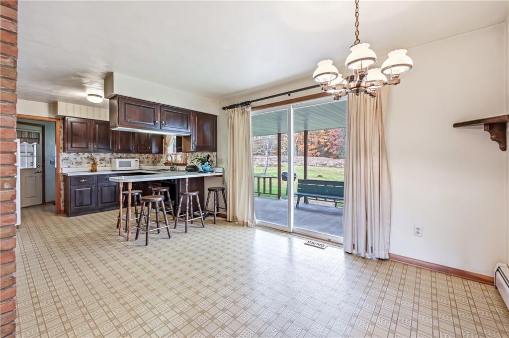 2635 South Keel Ridge Road Hermitage, PA 16148 - Photo 15 of 49 a view of a dining room with furniture window and outside view