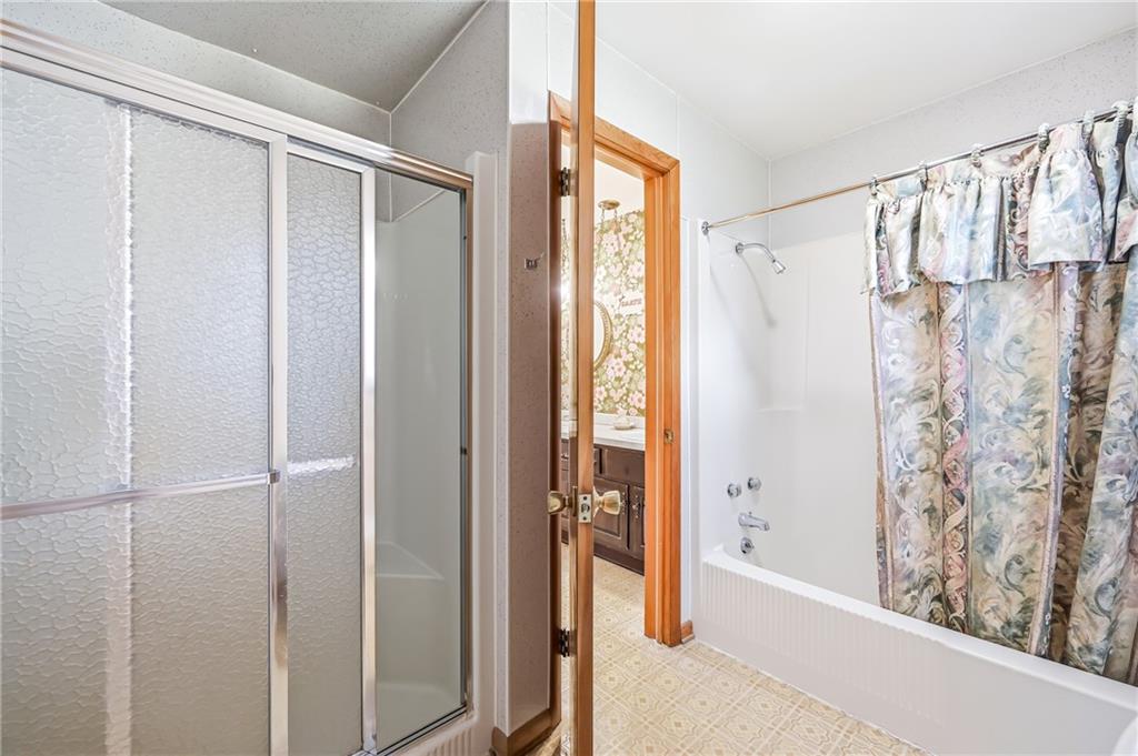 2635 South Keel Ridge Road Hermitage, PA 16148 - Photo 21 of 49 a bathroom with a shower and a glass door