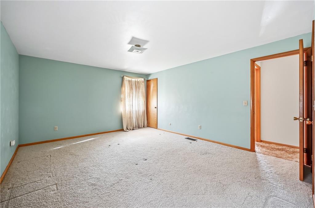 2635 South Keel Ridge Road Hermitage, PA 16148 - Photo 24 of 49 an empty room with windows and closet