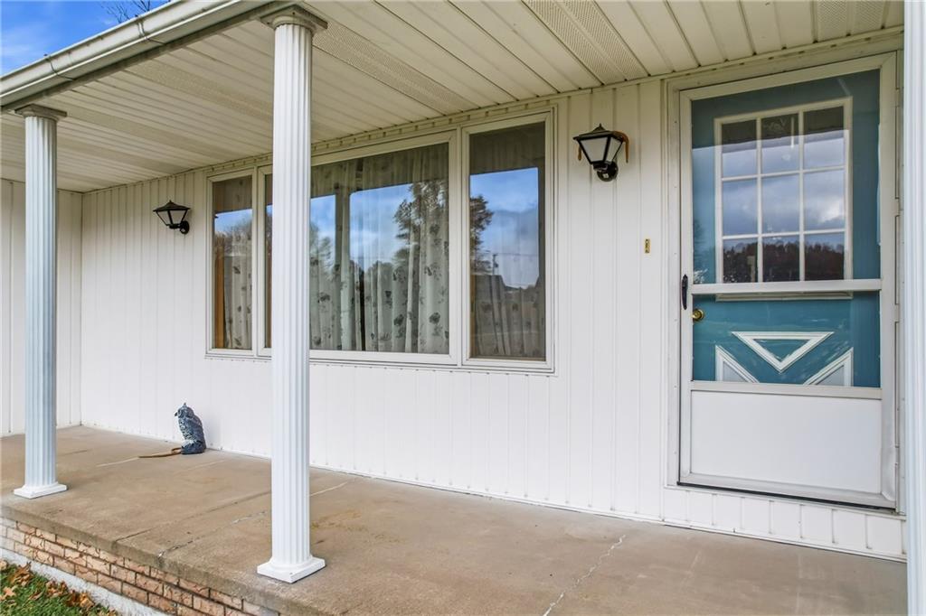2635 South Keel Ridge Road Hermitage, PA 16148 - Photo 37 of 49 a front view of a house with a porch