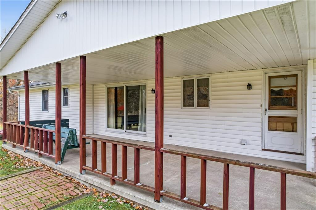 2635 South Keel Ridge Road Hermitage, PA 16148 - Photo 45 of 49 a view of a porch with wooden floor