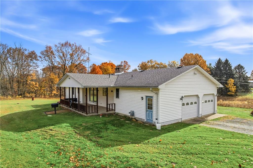 2635 South Keel Ridge Road Hermitage, PA 16148 - Photo 5 of 49 a view of a house with a yard and a porch
