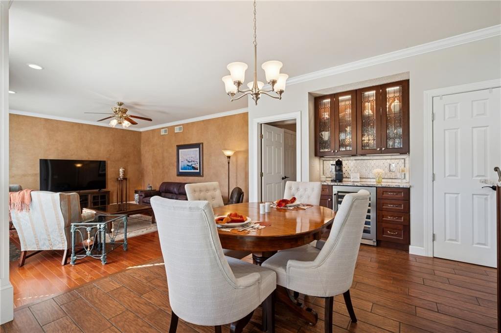 188 Meadow Spring Road Greensburg, PA 15601 - Photo 11 of 43 a view of a dining room with furniture window and wooden floor