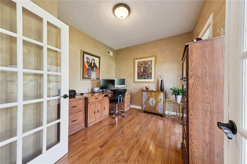 188 Meadow Spring Road Greensburg, PA 15601 - Photo 15 of 43 a room with furniture a window and wooden floor