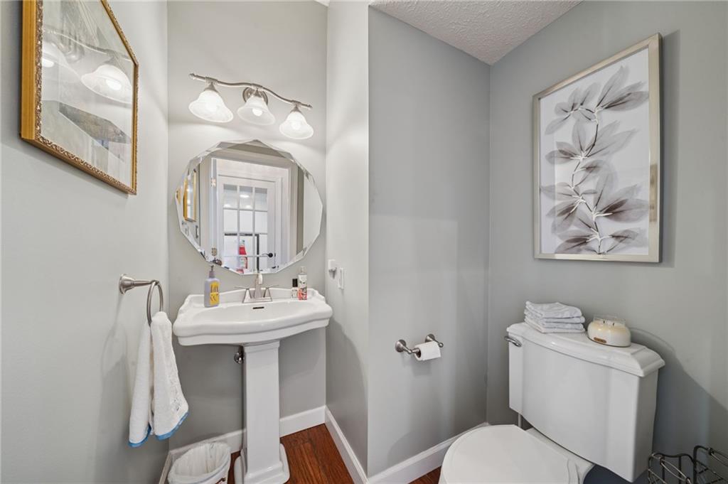 188 Meadow Spring Road Greensburg, PA 15601 - Photo 16 of 43 a bathroom with a toilet a sink and mirror