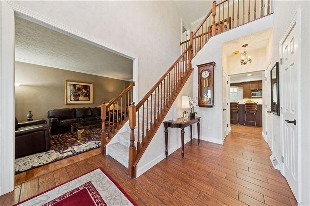 188 Meadow Spring Road Greensburg, PA 15601 - Photo 2 of 43 a view of entryway and hall with wooden floor