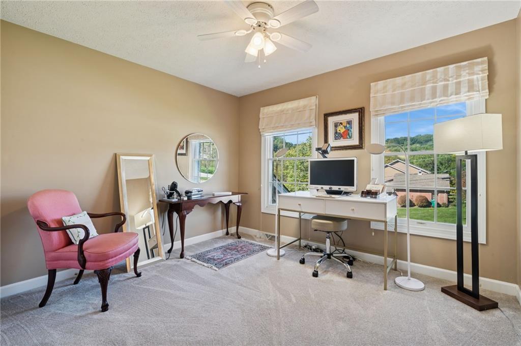 188 Meadow Spring Road Greensburg, PA 15601 - Photo 22 of 43 a view of a livingroom with workspace and a window