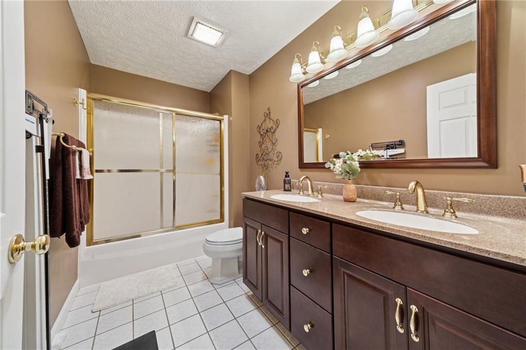 188 Meadow Spring Road Greensburg, PA 15601 - Photo 25 of 43 a spacious bathroom with a double vanity sink mirror and double