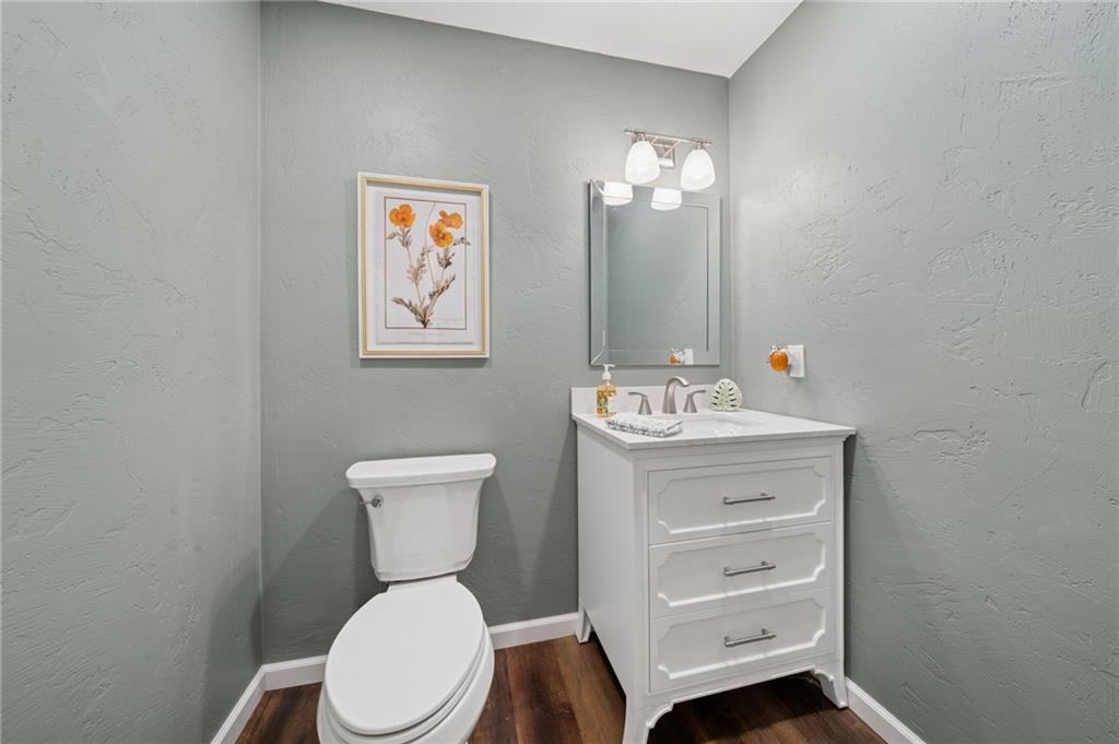 188 Meadow Spring Road Greensburg, PA 15601 - Photo 31 of 43 a bathroom with a toilet sink and mirror