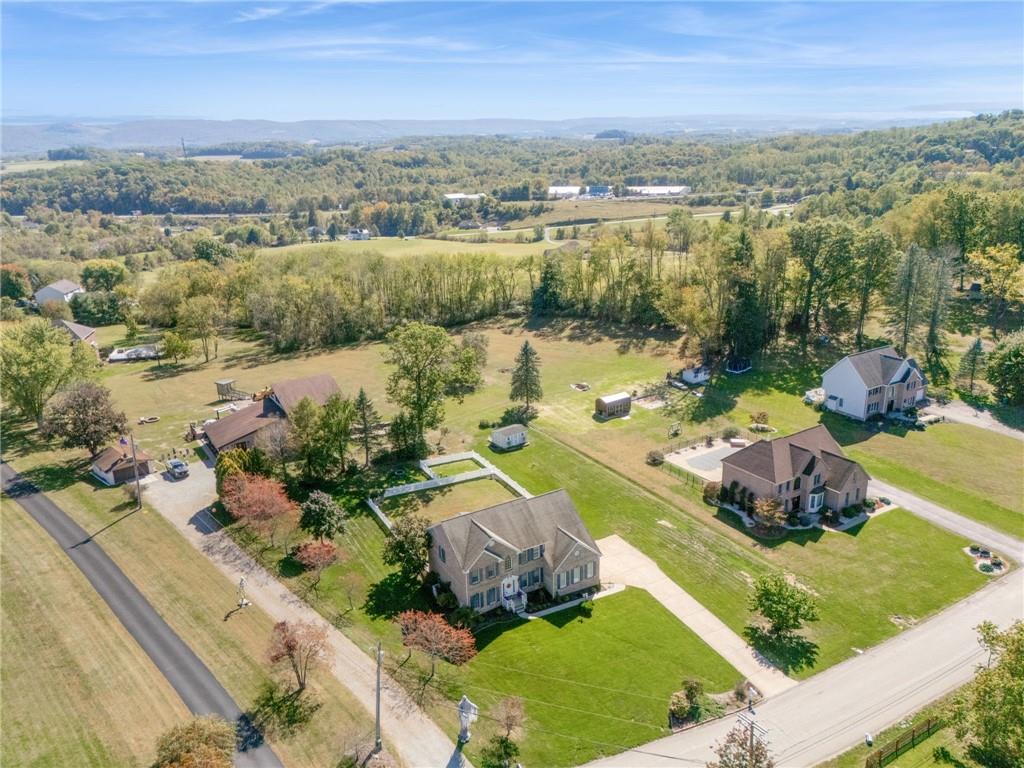 188 Meadow Spring Road Greensburg, PA 15601 - Photo 40 of 43 an aerial view of a house with a lake view