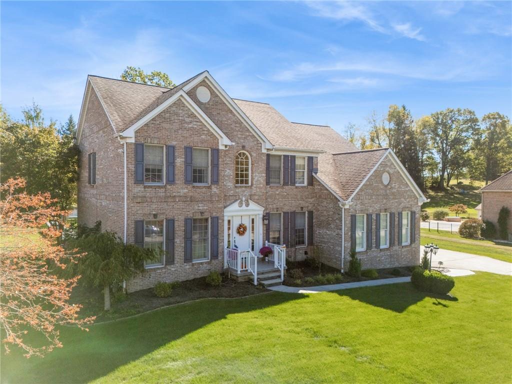 188 Meadow Spring Road Greensburg, PA 15601 - Photo 42 of 43 front view of a house with a yard