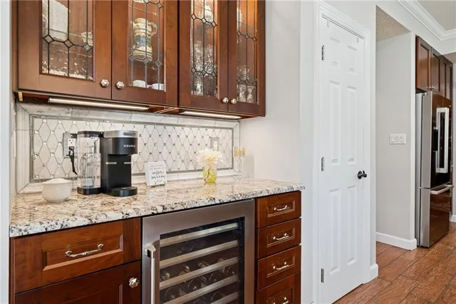 a kitchen with granite countertop a sink and a granite counter tops