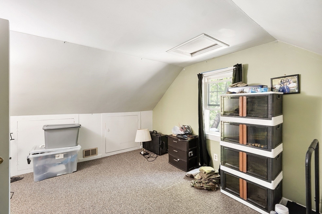 29 Warwick Road Gardner, MA 01440 - Photo 27 of 31 a room with furniture and a flat screen tv