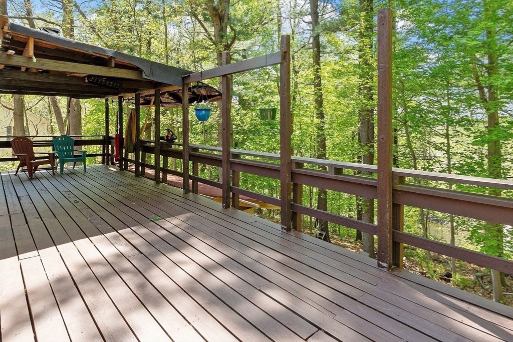 29 Warwick Road Gardner, MA 01440 - Photo 7 of 31 a view of deck with wooden floor and outdoor seating