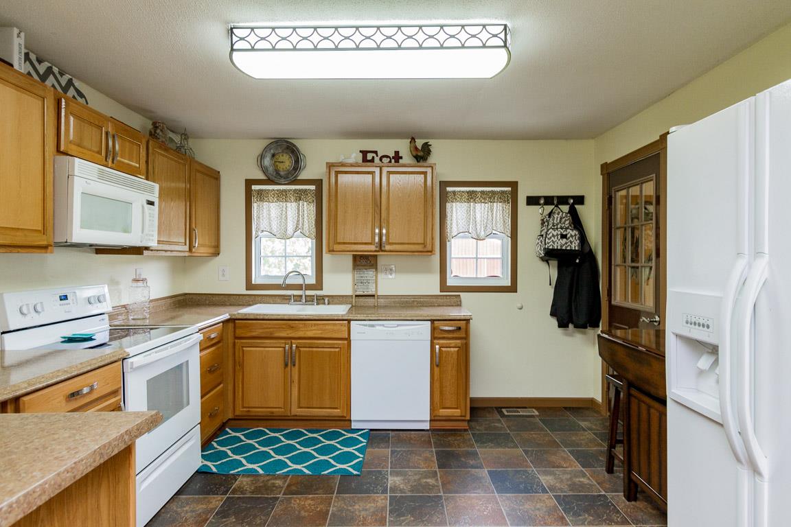 3507 Anderson Road Cedar Hill, TN 37032 - Photo 2 of 30 a kitchen with stainless steel appliances granite countertop a refrigerator and a stove
