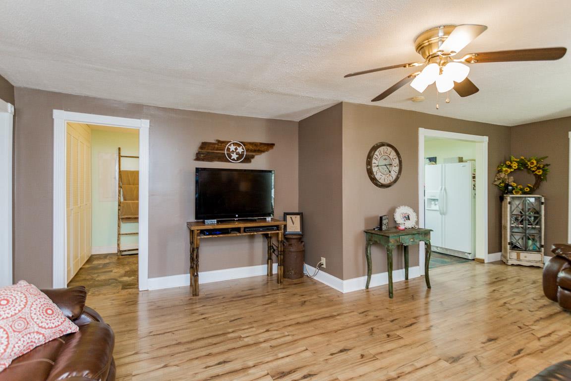 3507 Anderson Road Cedar Hill, TN 37032 - Photo 11 of 30 a living room with furniture and a flat screen tv