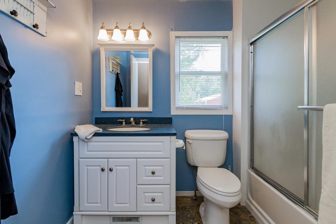3507 Anderson Road Cedar Hill, TN 37032 - Photo 14 of 30 a bathroom with a toilet sink and mirror