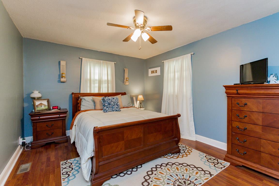 3507 Anderson Road Cedar Hill, TN 37032 - Photo 15 of 30 a bedroom with a bed and a flat screen tv