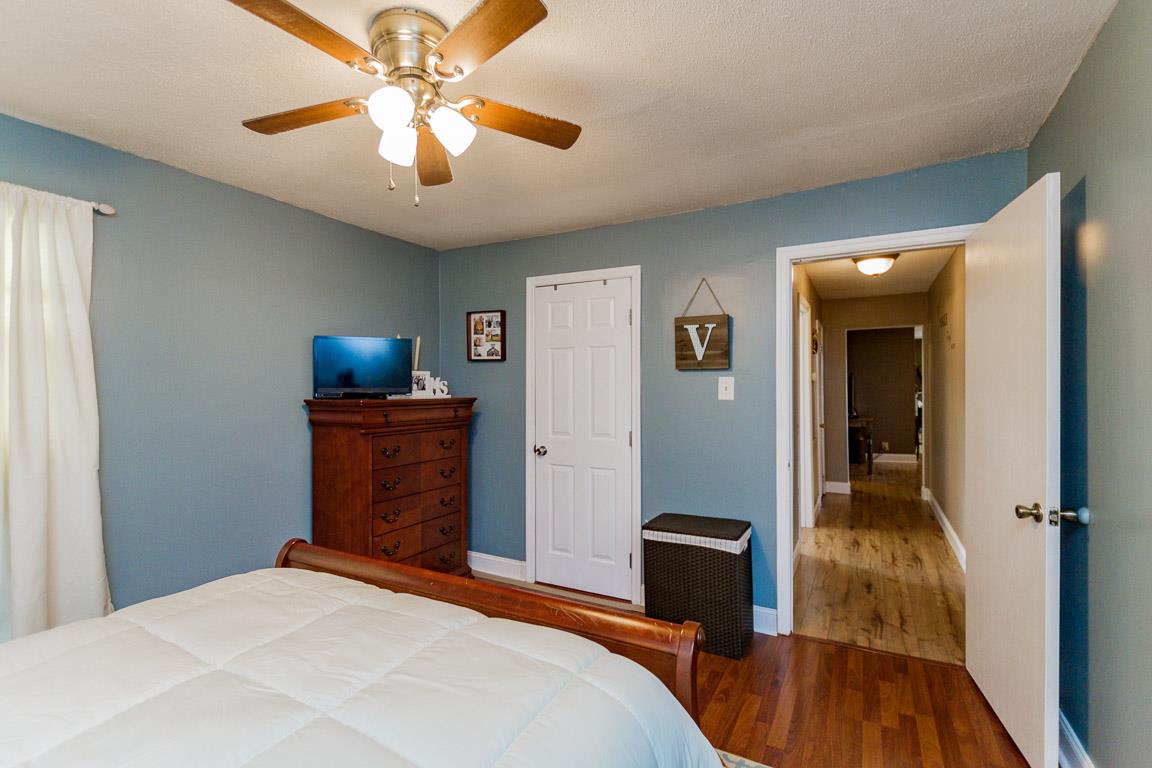 3507 Anderson Road Cedar Hill, TN 37032 - Photo 16 of 30 a bedroom with a bed and a view of bathroom