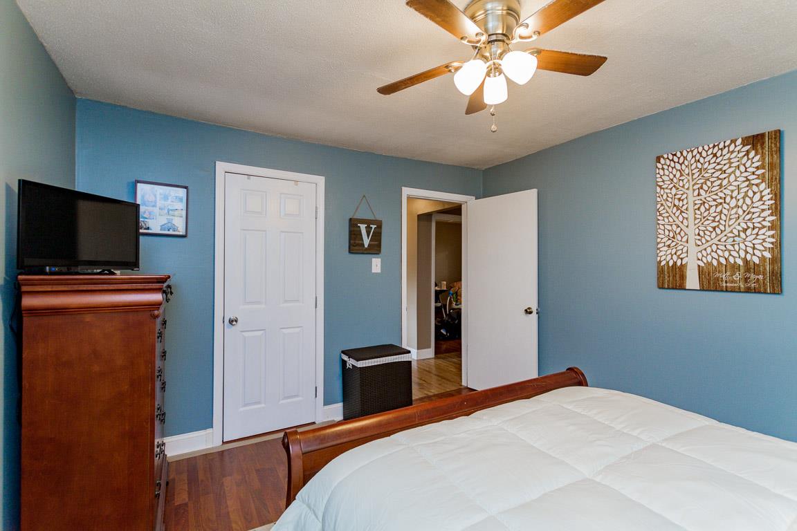 3507 Anderson Road Cedar Hill, TN 37032 - Photo 17 of 30 a bedroom with a bed and a flat screen tv