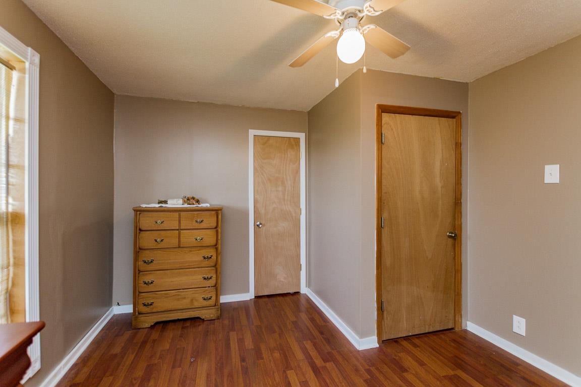 3507 Anderson Road Cedar Hill, TN 37032 - Photo 22 of 30 an empty room with wooden floor closet and windows