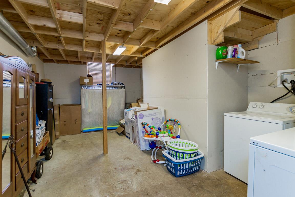 3507 Anderson Road Cedar Hill, TN 37032 - Photo 26 of 30 a room with storage and a table