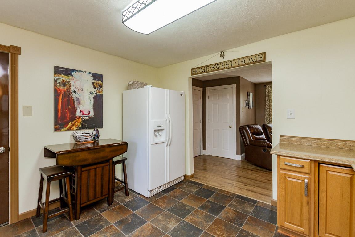 3507 Anderson Road Cedar Hill, TN 37032 - Photo 4 of 30 a hallway with a table and chairs