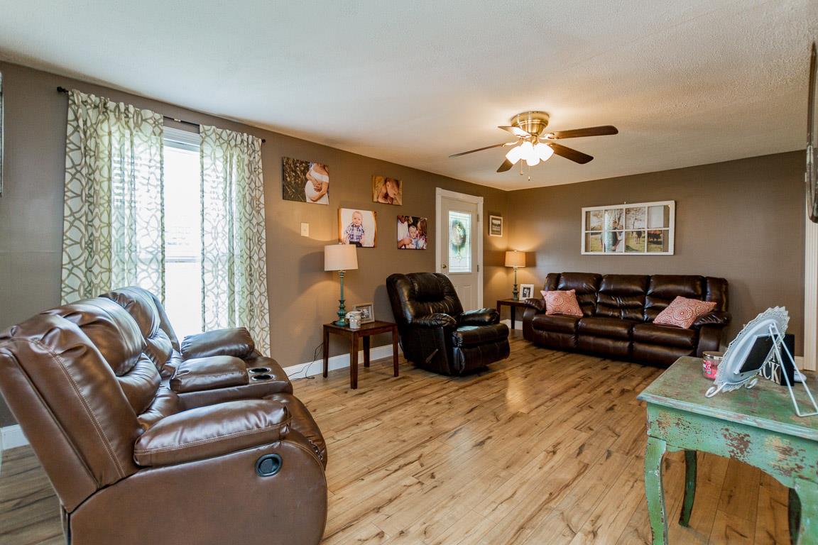 3507 Anderson Road Cedar Hill, TN 37032 - Photo 7 of 30 a living room with furniture ceiling fan and a window