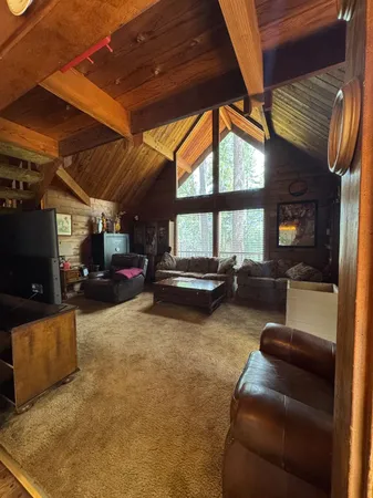 a view of a house with couches on the wall