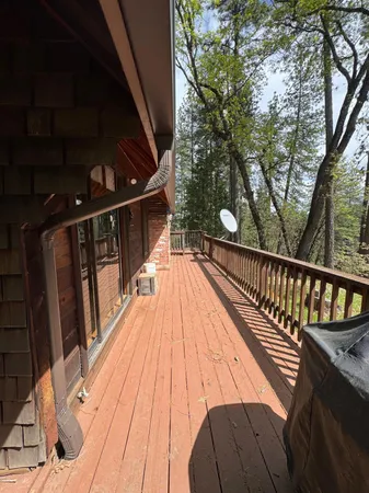 a kitchen with stainless steel appliances wooden cabinets a stove and a refrigerator