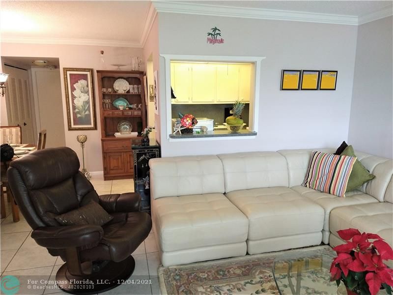 287 Markham M, Unit 287 Deerfield Beach, FL 33442 - Photo 3 of 64 a bedroom with a bed and couch