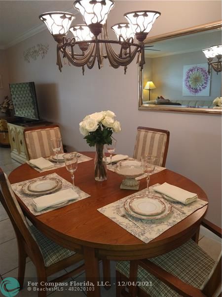 287 Markham M, Unit 287 Deerfield Beach, FL 33442 - Photo 33 of 64 a view of a dining room with furniture