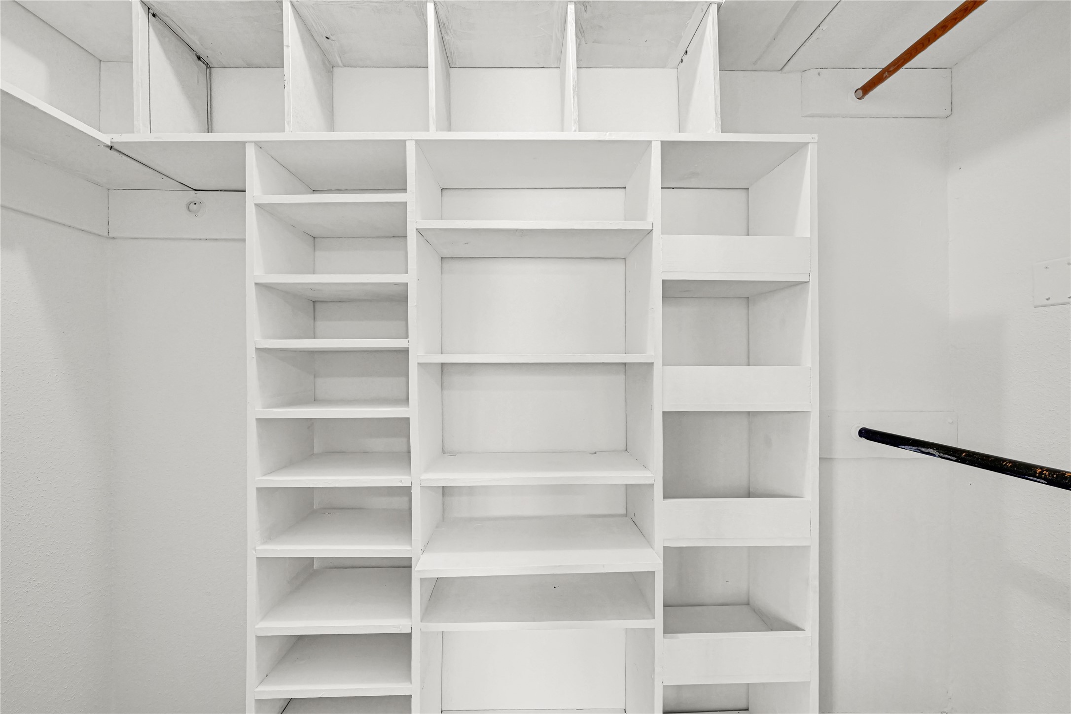 1500 Bay Area Boulevard, Unit 155 Houston, TX 77058 - Photo 11 of 16 a view of walk in closet with empty racks