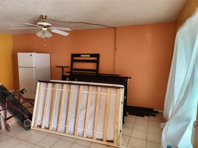 a view of a livingroom with a staircase