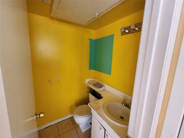 a bathroom with a sink and a toilet