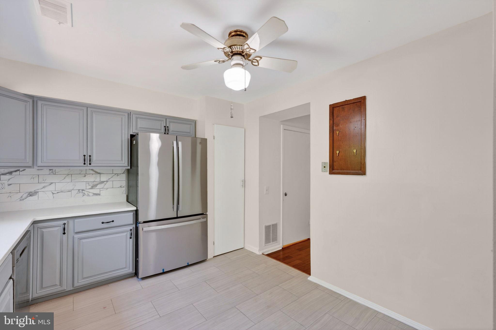 12447 Loft Lane Silver Spring, MD 20904 - Photo 16 of 45 Modern kitchen with sleek finishes.