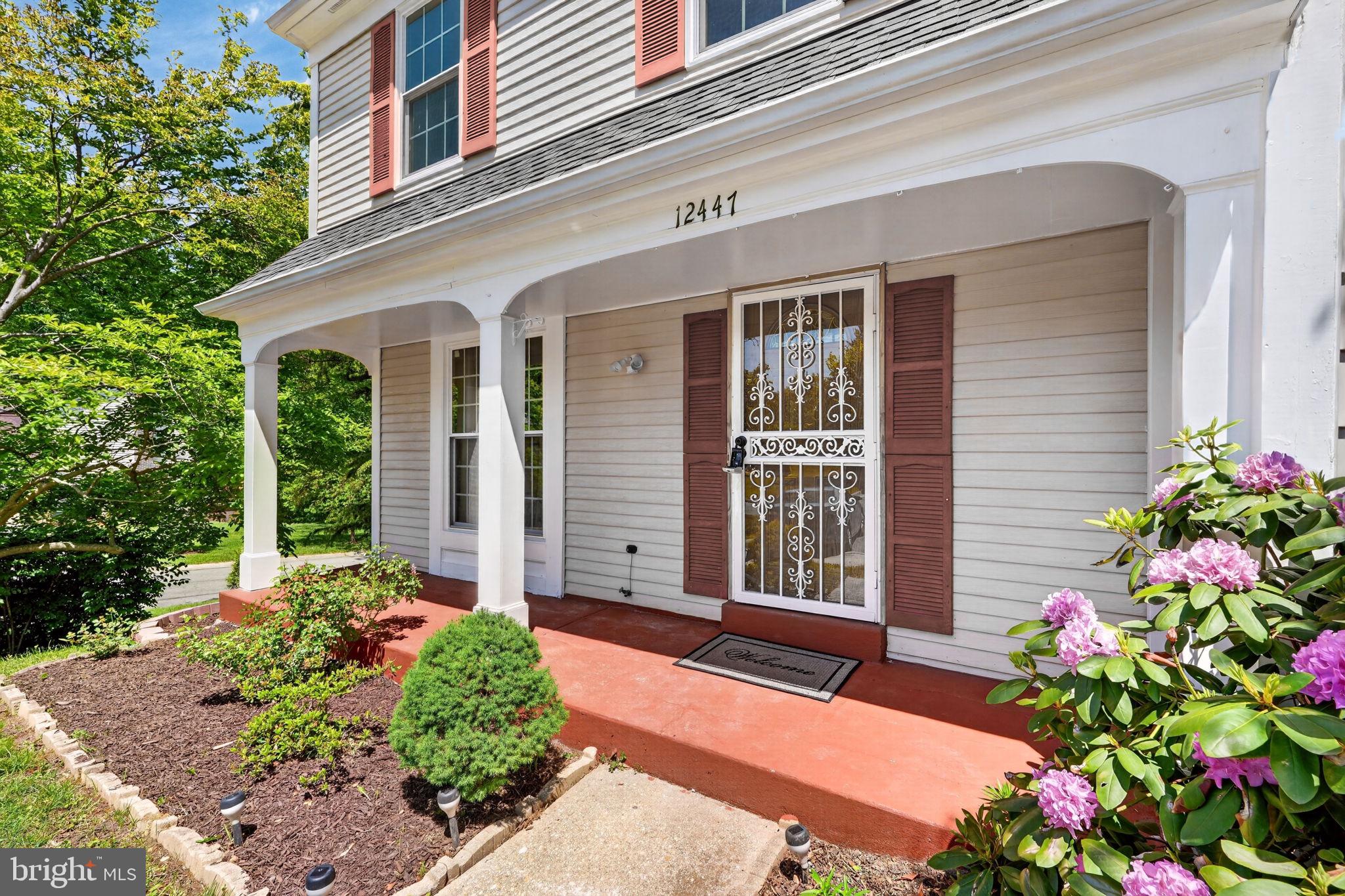 12447 Loft Lane Silver Spring, MD 20904 - Photo 3 of 45 Charming entrance with vibrant blooms.