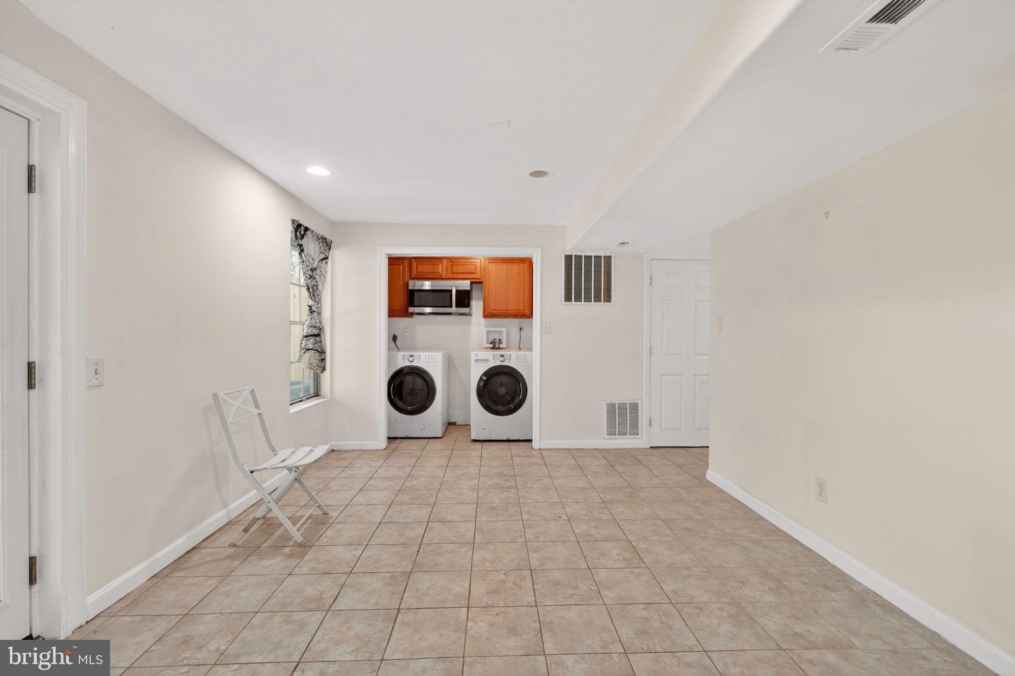 12447 Loft Lane Silver Spring, MD 20904 - Photo 37 of 45 Versatile space with laundry amenities.