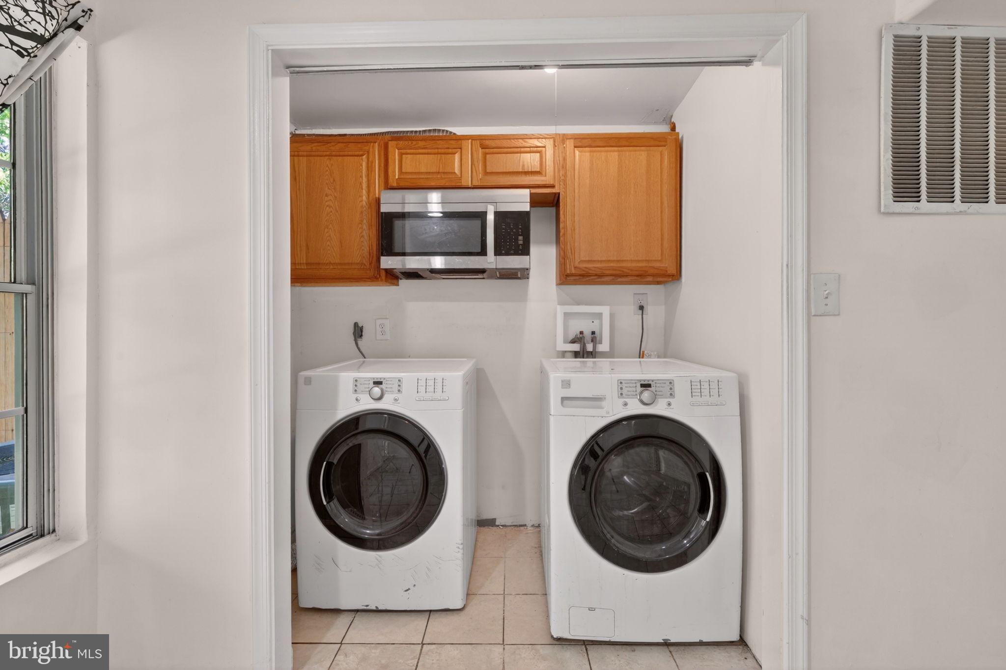 12447 Loft Lane Silver Spring, MD 20904 - Photo 38 of 45 Bright and functional laundry nook.