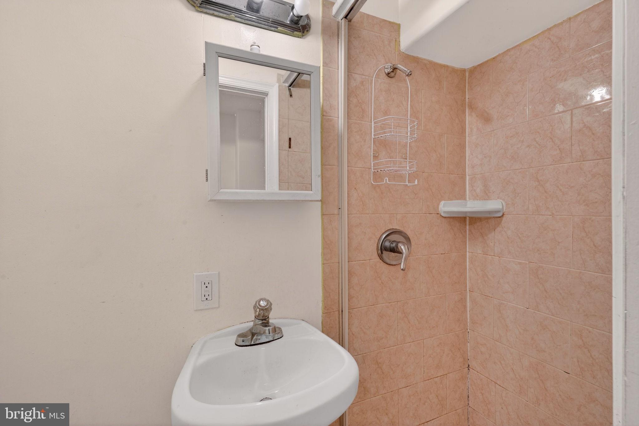 12447 Loft Lane Silver Spring, MD 20904 - Photo 41 of 45 Compact and functional bathroom space.