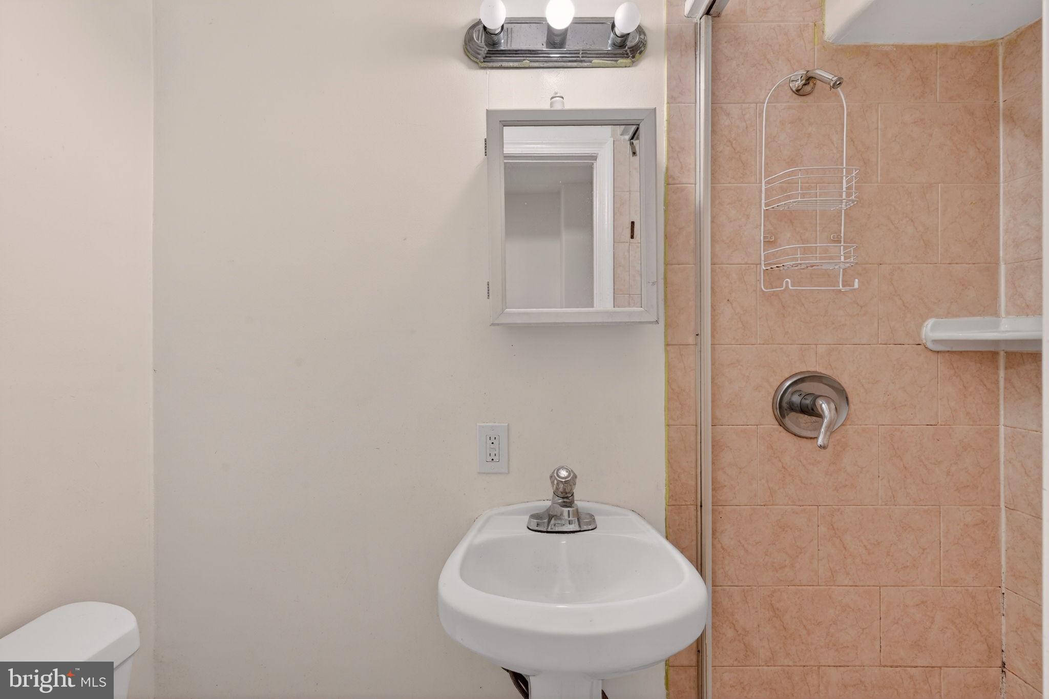12447 Loft Lane Silver Spring, MD 20904 - Photo 42 of 45 Compact bathroom with modern fixtures.