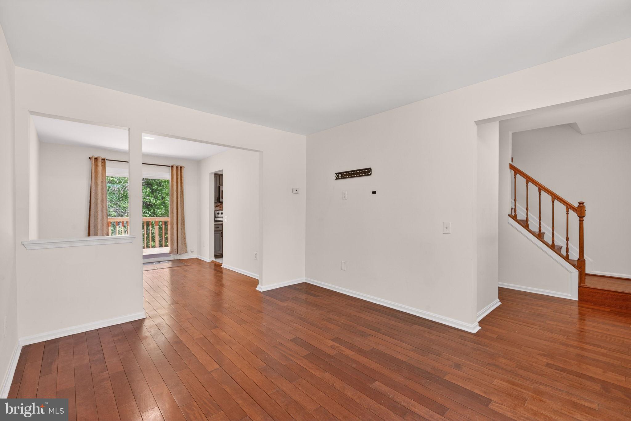 12447 Loft Lane Silver Spring, MD 20904 - Photo 10 of 45 Spacious living area with warm tones.
