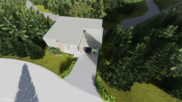 a view of a house with a yard and garage